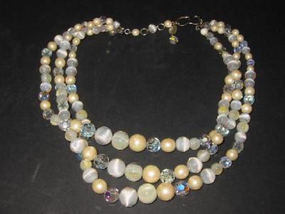 Appraisal: A CHRISTIAN DIOR BEAD NECKLACE comprising three graduated strands of