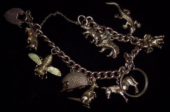 Appraisal: A ct gold charm bracelet hung various animals and insects