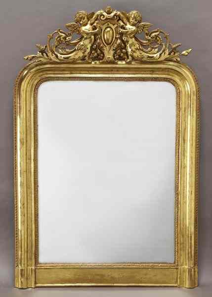 Appraisal: Louis XV style gilt mirror carved with two puttiholding a