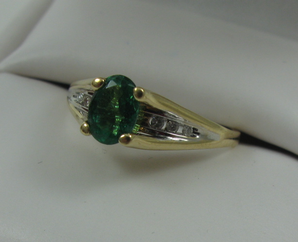 Appraisal: EMERALD AND DIAMOND RING K yellow gold setting estimated weight