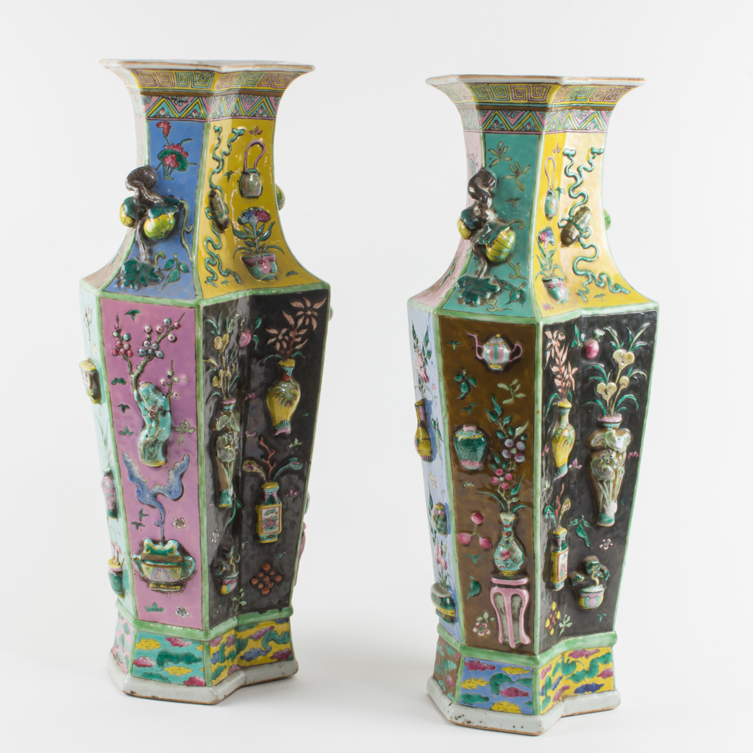 Appraisal: PAIR OF CHINESE FAMILLE ROSE EMBOSSED HUNDRED ANTIQUE VASES Pair