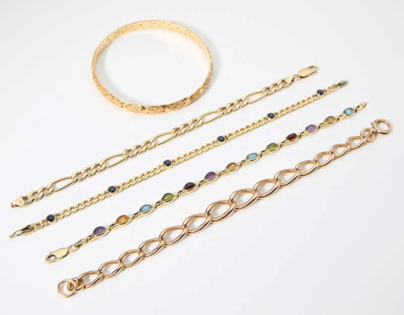 Appraisal: Five yellow gold bracelets one K bangle one K chain