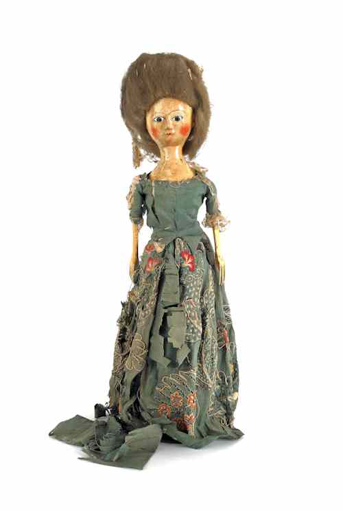 Appraisal: English Queen Anne wooden doll with brown glass eyes and