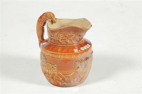 Appraisal: PRESENTATION ROCKINGHAM PITCHER Marked for Salamander Works Woodridge New Jersey