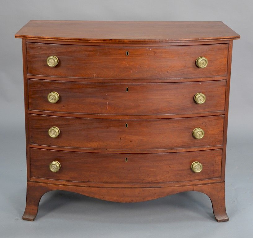 Appraisal: Federal cherry and mahogany bowed front four drawer chest on