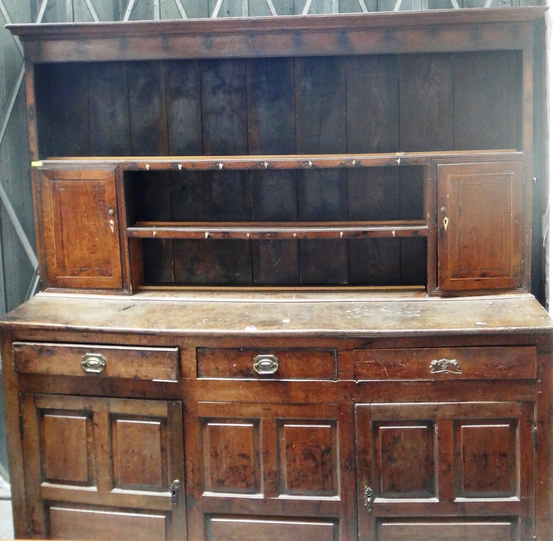 Appraisal: A George III and later oak dresser the enclosed two