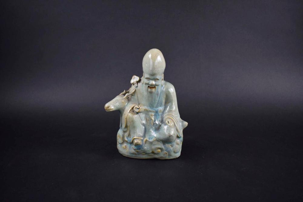 Appraisal: CHINESE QING DYNASTY POTTERY FIGURE OF SHOU LAOChen Lung Period