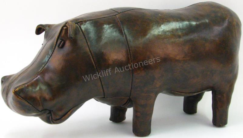 Appraisal: A Dmitri Omersa leather hippo footstool made in England l