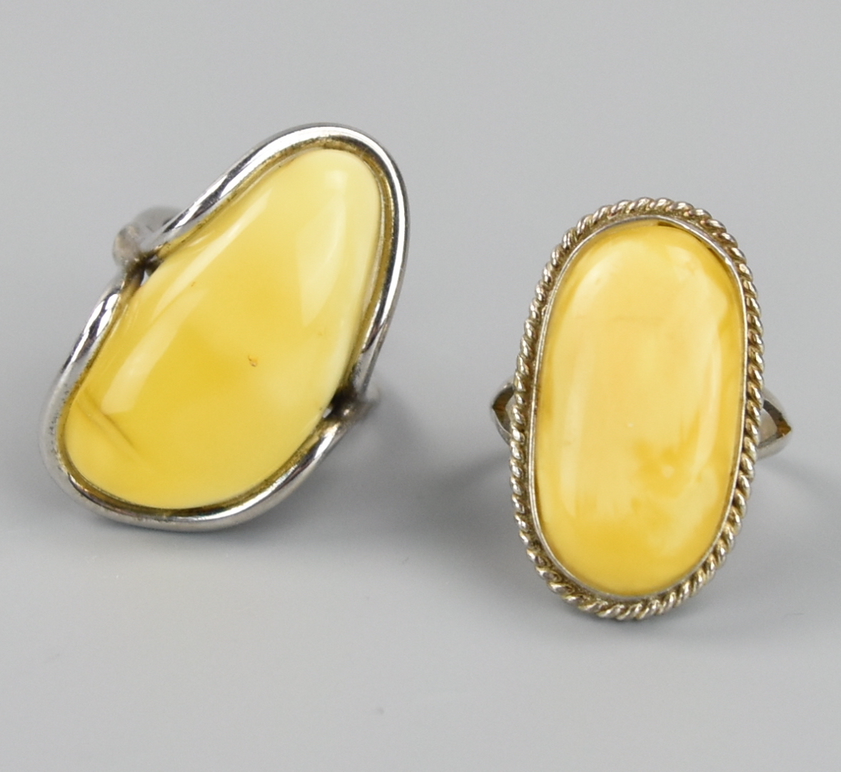 Appraisal: TWO CHINESE BEESWAX SLILVER RINGS two Chinese beeswax Silver ring