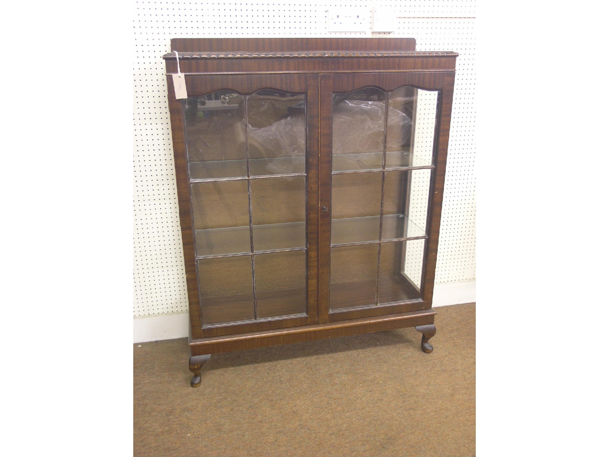 Appraisal: An early th century mahogany display cabinet two plate glass