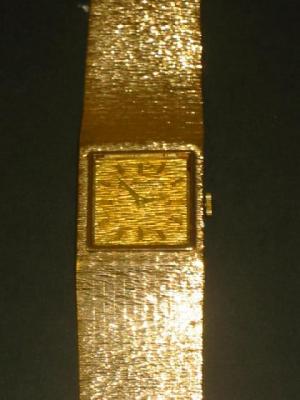 Appraisal: A BUECHE GIROD CT GOLD WATCH the square dial with