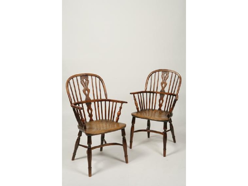 Appraisal: A PAIR OF YEW WOOD BEECH AND ELM WINDSOR ARMCHAIRS