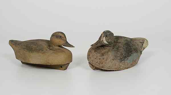 Appraisal: Pair of Carved Wood Decoys Early th century Carved and