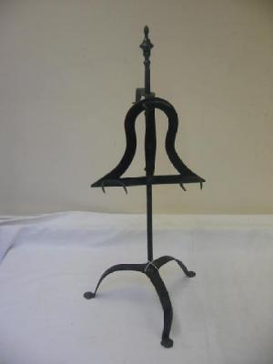 Appraisal: A WROUGHT IRON LARK SPIT with turned finial three set