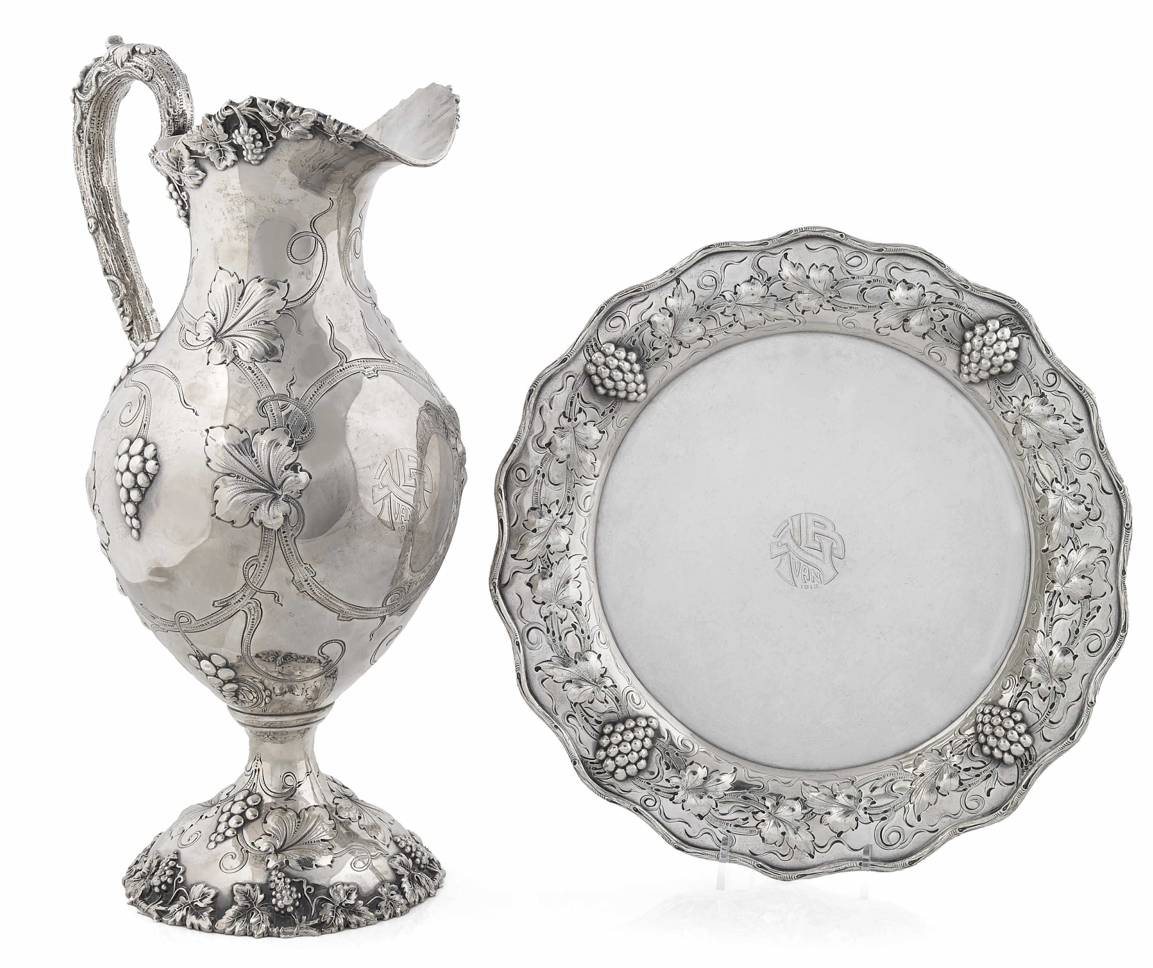 Appraisal: A sterling pint pitcher with complementary under tray Monogrammed J