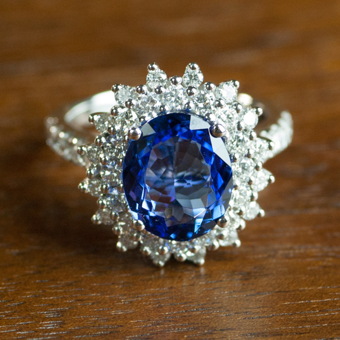 Appraisal: TANZANITE DIAMOND AND FOURTEEN KARAT WHITE GOLD RING with round-cut