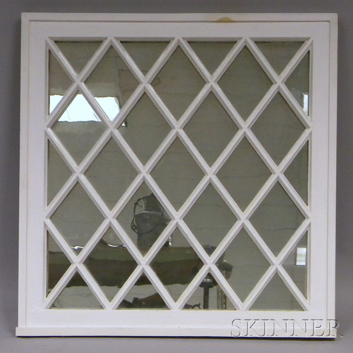 Appraisal: White-painted Architectural Wooden Diamond Patterned Window with Mirrored Glass Panel