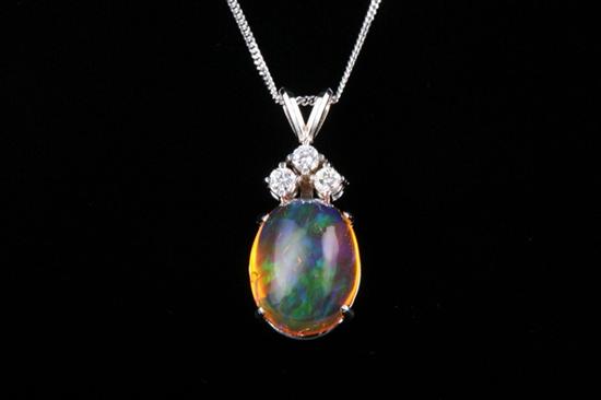 Appraisal: K WHITE GOLD MEXICAN FIRE OPAL AND DIAMOND PENDANT Oval