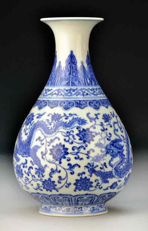 Appraisal: Chinese Blue White Porcelain VaseFinely painted to depict two five-clawed