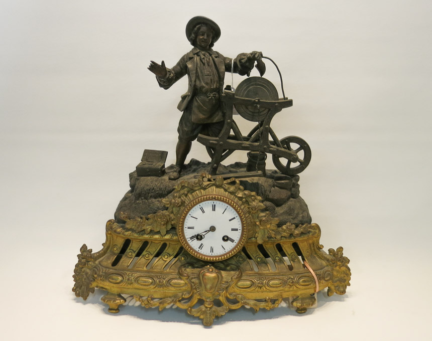 Appraisal: FRENCH SPELTER STATUE CLOCK having a cobbler polishing a shoe