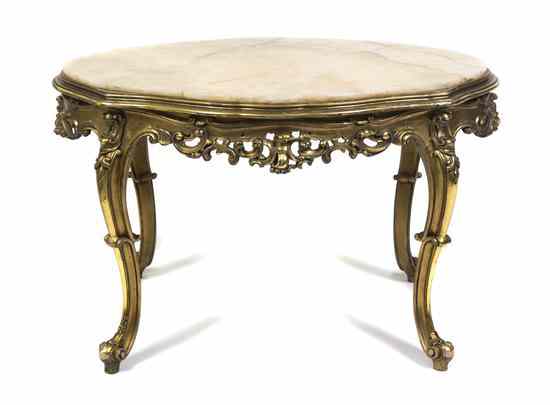 Appraisal: A Louis XV Style Giltwood Low Table having a cream