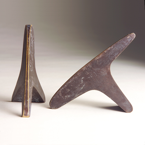 Appraisal: CARL AUBOCK Pair of bronze anvil-shaped bookends with original dark