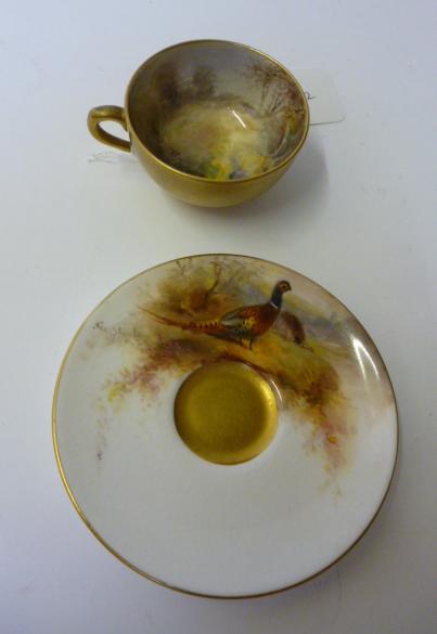 Appraisal: A ROYAL WORCESTER PORCELAIN CABINET CUP AND SAUCER painted by