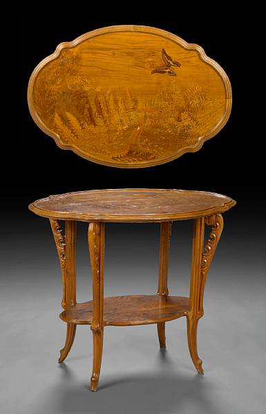 Appraisal: A Gall marquetry inlaid walnut two tier table circa With