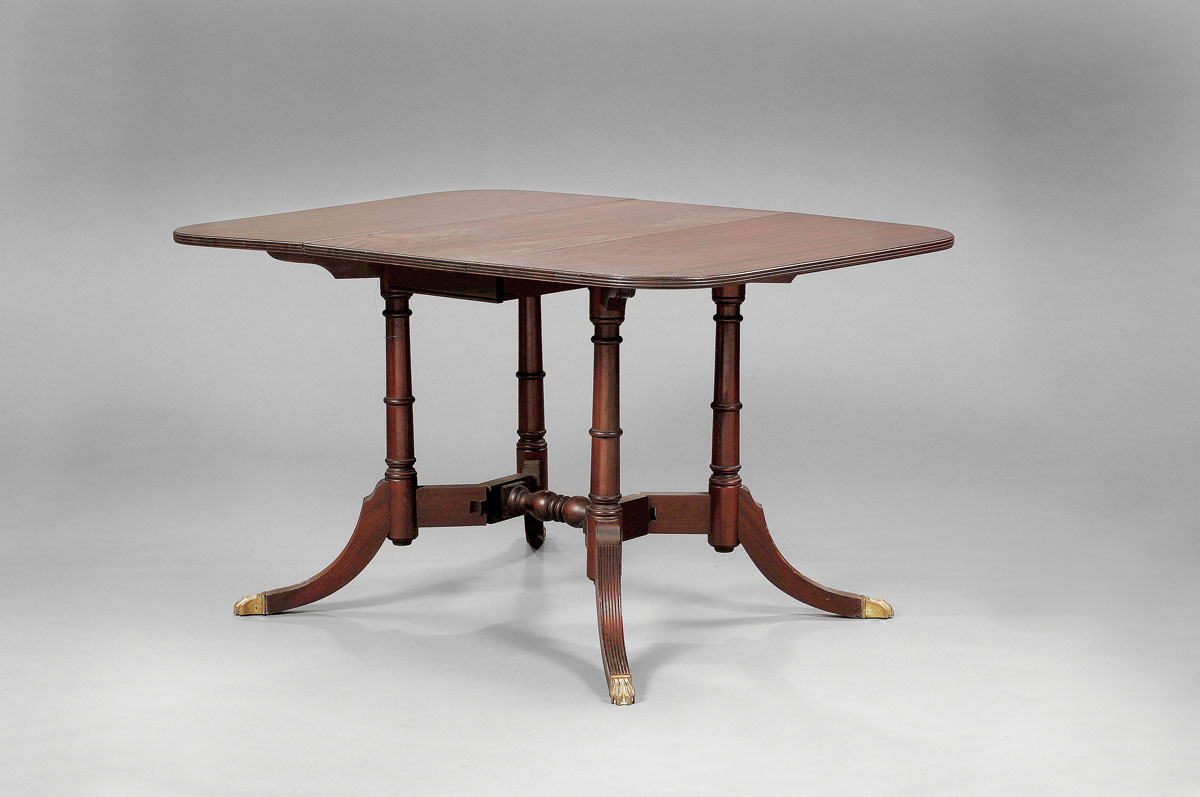 Appraisal: CLASSICAL STYLE MAHOGANY DROP LEAF TABLE Th e molded rectangular