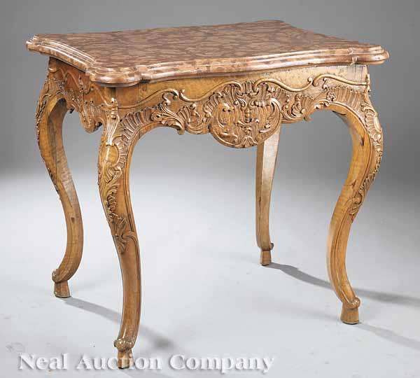 Appraisal: An Antique French Provincial Carved Walnut Center Table in the