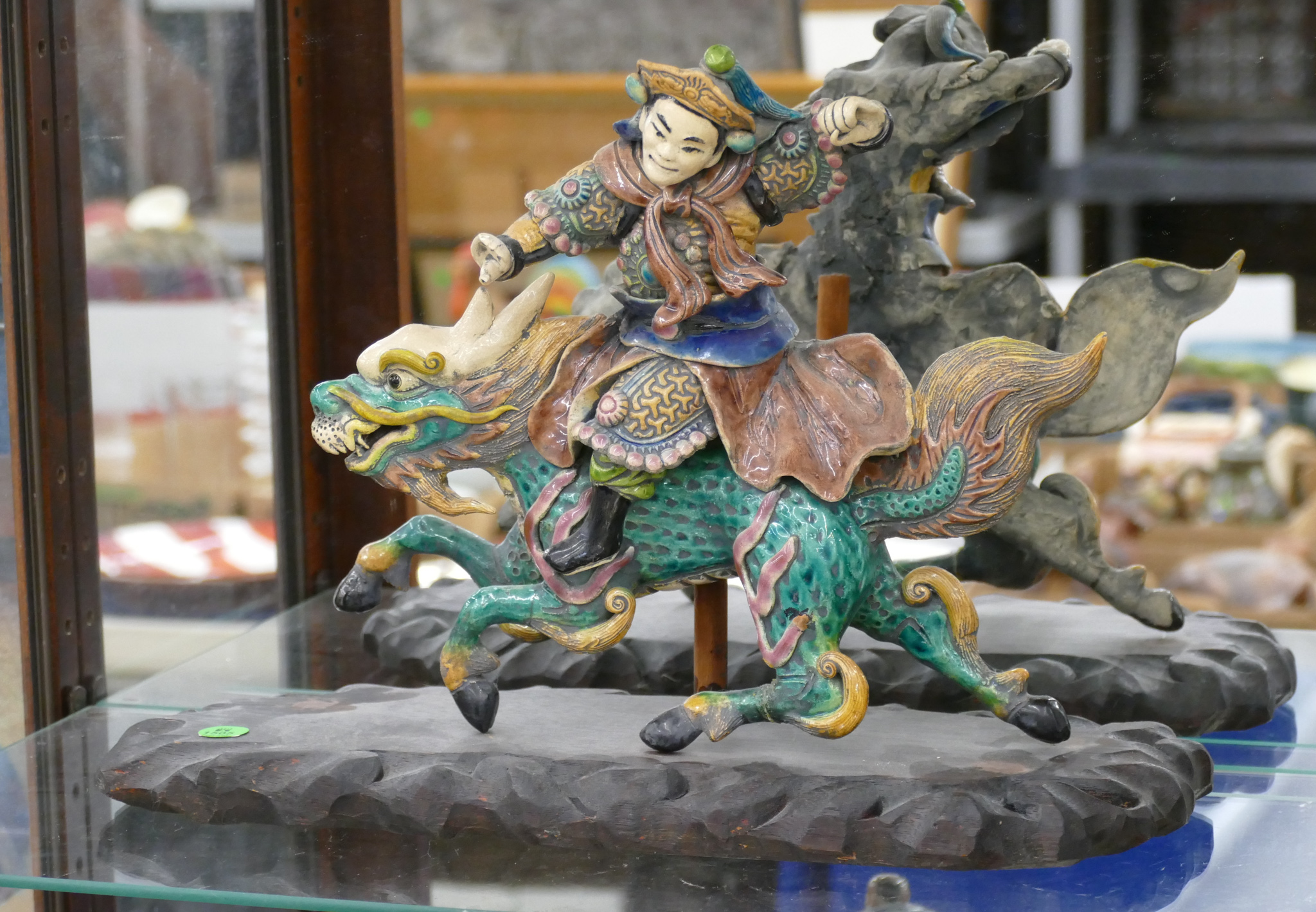 Appraisal: Old Chinese Figural Qilin Roof Tile on Stand ''