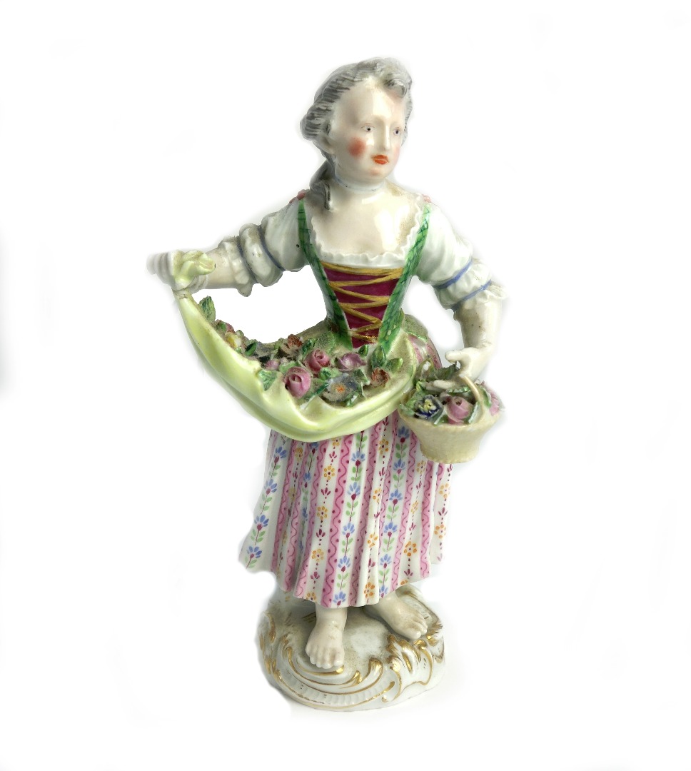 Appraisal: A Meissen figure of a girl early th century standing