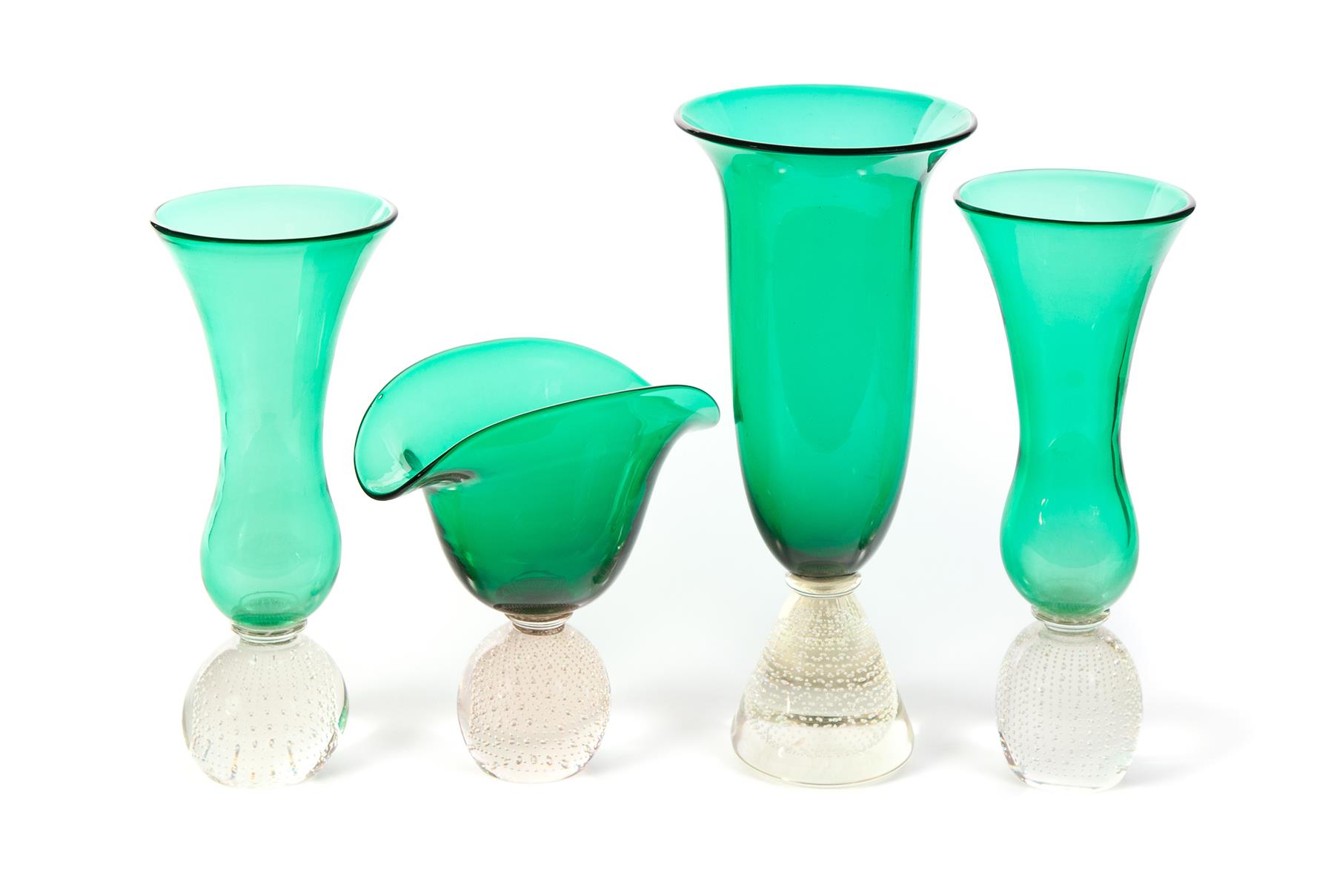 Appraisal: FOUR GREEN ERICKSON VASES WITH CONTROLLED BUBBLE CLEAR PAPERWEIGHT BASES