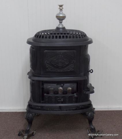 Appraisal: Antique c Cast Iron Crown Jewel Wood Stove Fire Fly