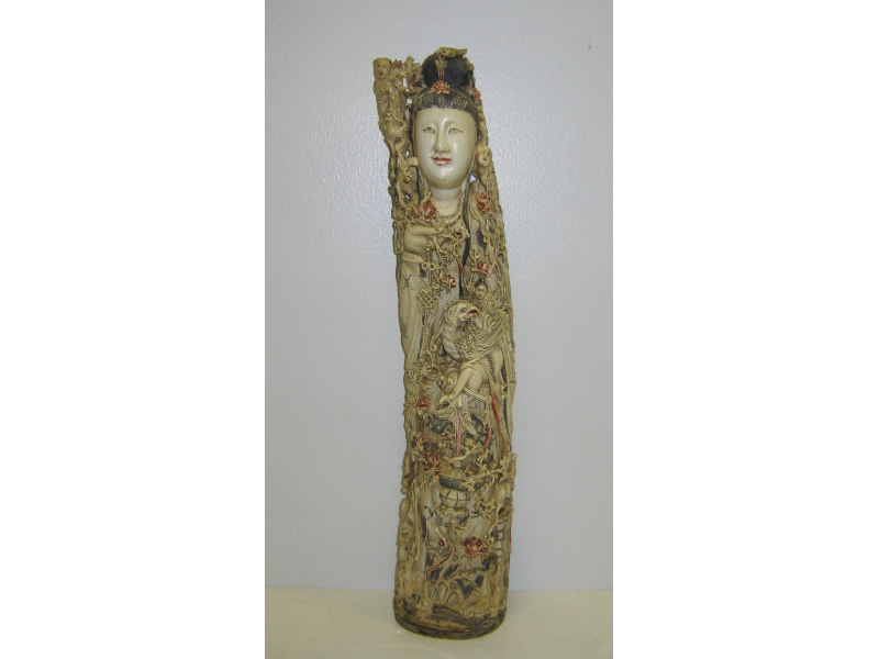 Appraisal: FINELY CARVED ASIAN IVORY TUSK Elaborately carved female figure decorated