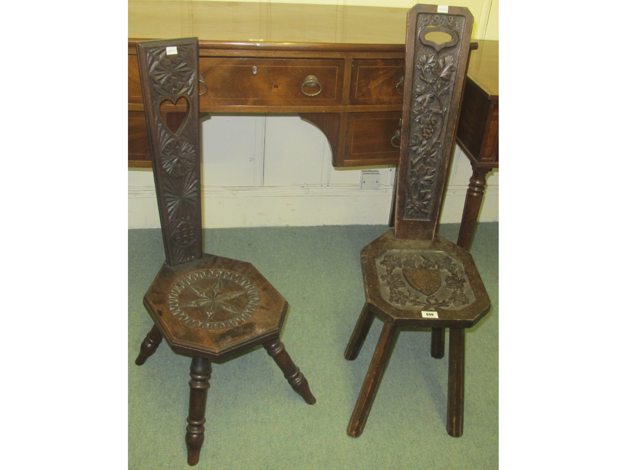 Appraisal: Two oak spinning chairs one dated