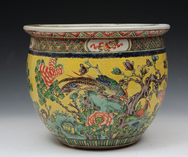 Appraisal: A CHINESE FISH BOWL JARDINIERE decorated pheasant upon rock amidst