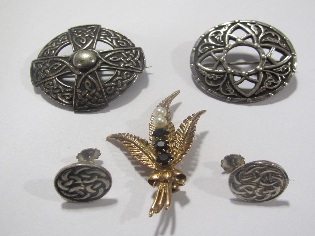 Appraisal: Lot comprising two Iona silver Celtic knotwork brooches and similar