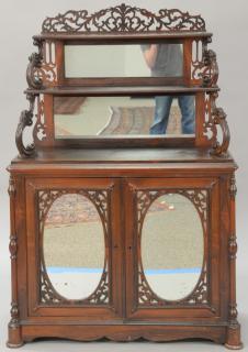 Appraisal: Rosewood Victorian etagere with cabinet base and birdseye maple interior