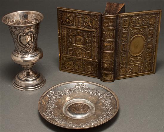 Appraisal: Continental repousse silver Kiddush cup th Century similar saucer and