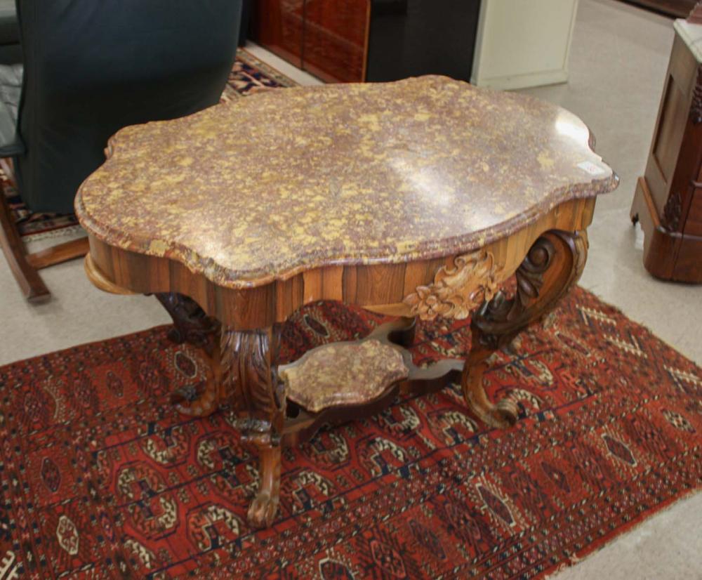 Appraisal: VICTORIAN MARBLE-TOP ROSEWOOD CENTER TABLE American mid- th century fitted