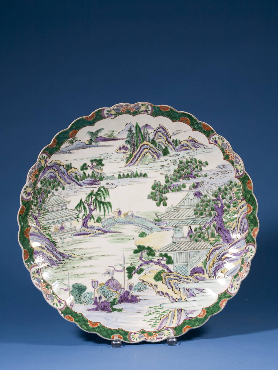 Appraisal: JAPANESE PORCELAIN SCALLOPED EDGE CHARGER WITH RIVER LANDSCAPE IN GREEN