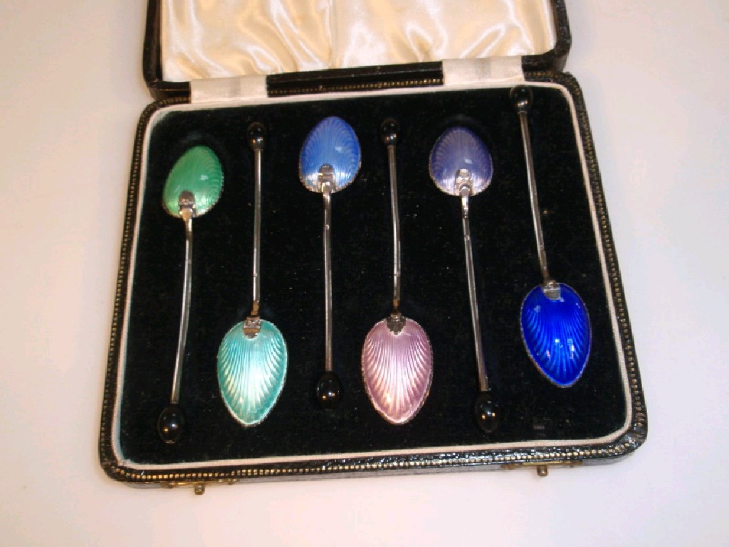 Appraisal: A set of six George V silver bean coffee spoons