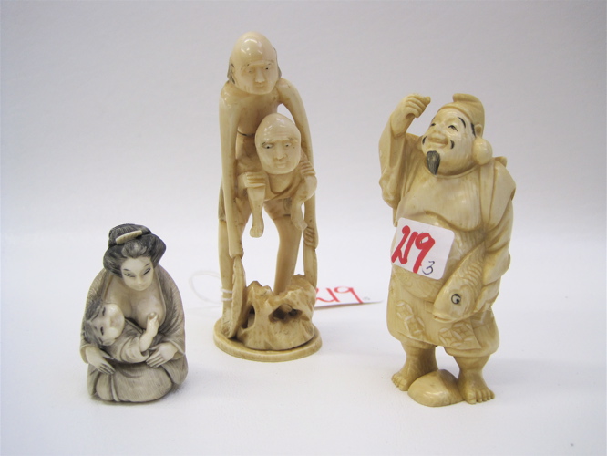 Appraisal: THREE ASIAN CARVED IVORY FIGURES a Japanese netsuke of a