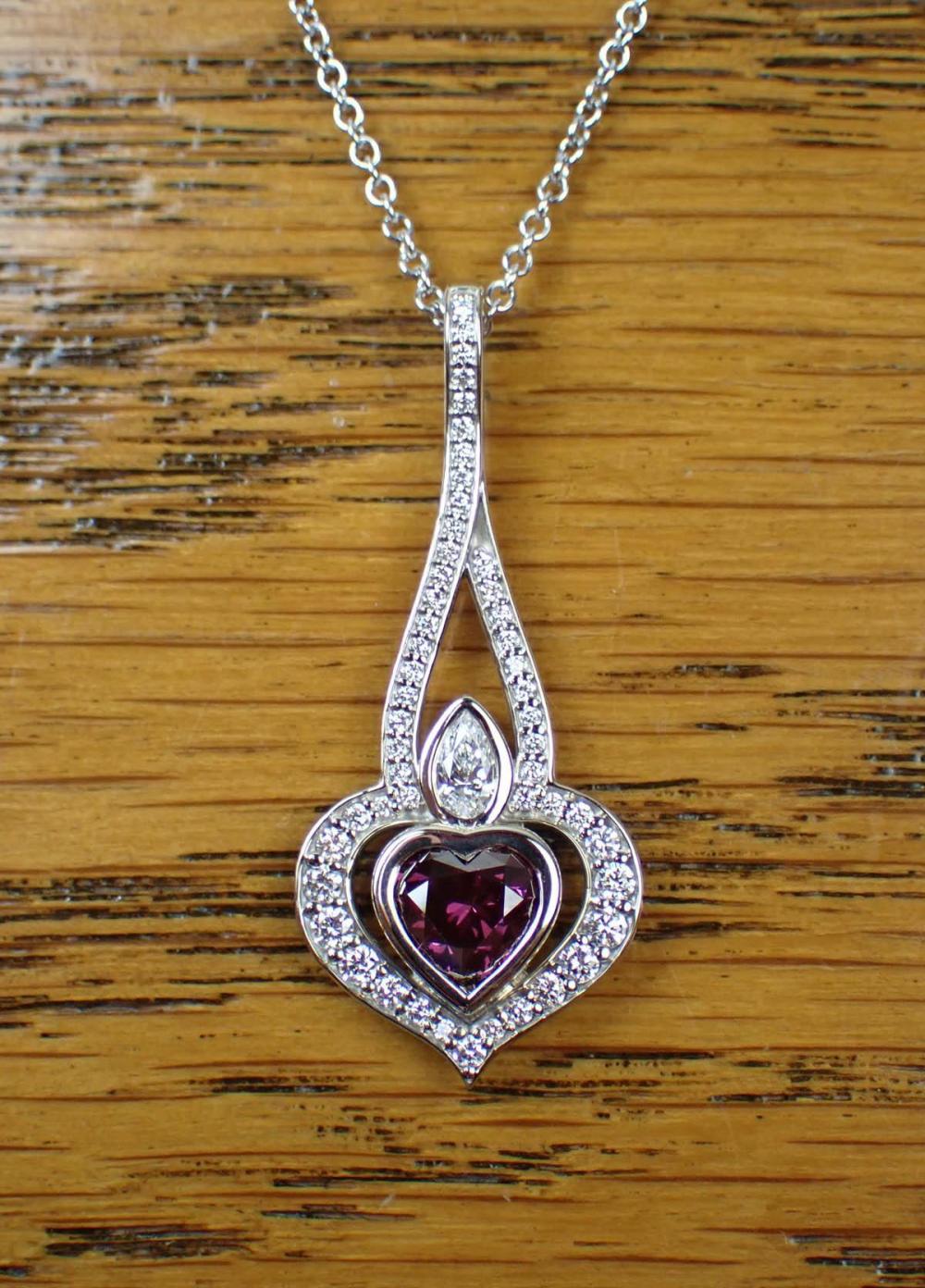 Appraisal: GIA CERTIFIED FANCY PURPLISH PINK DIAMOND NECKLACE with an k