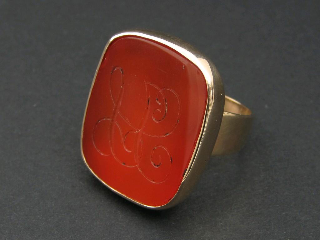 Appraisal: A Gentleman's Signet Ring set carnelian seal carved monogram stamped