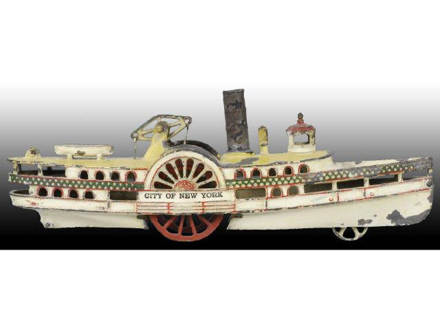 Appraisal: Cast Iron Wilkins Side-Wheel Paddle Boat Toy Description Passenger boat