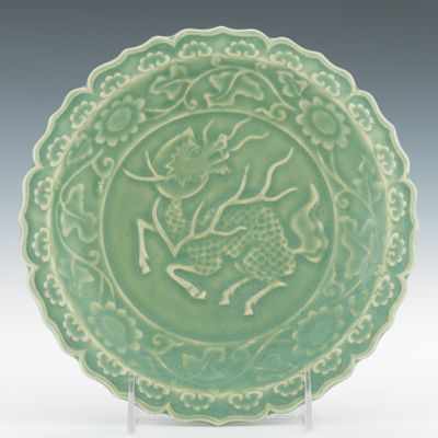 Appraisal: A Celadon Glazed Qilin Dish Thickly potted celadon dish with