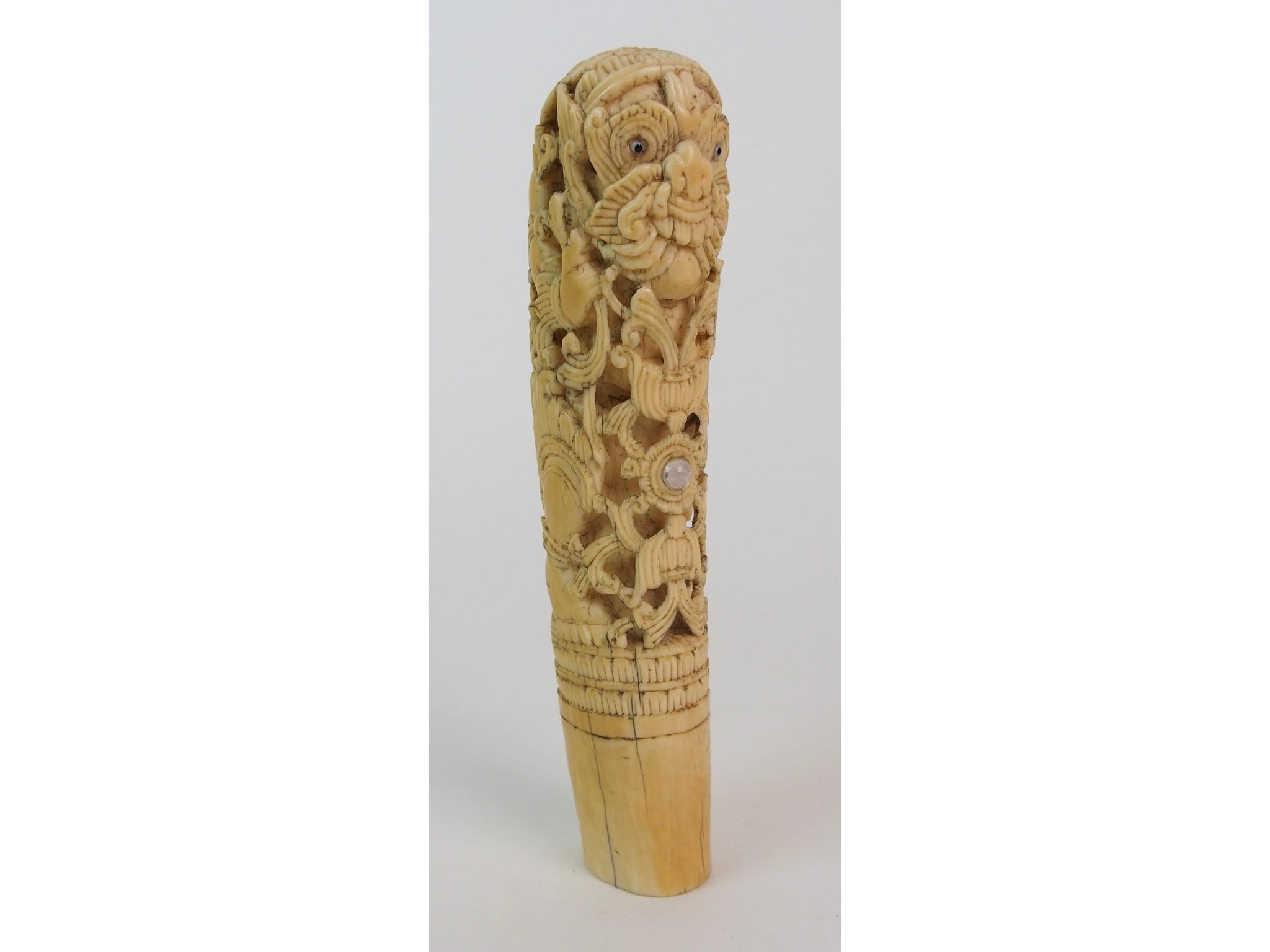 Appraisal: A Burmese ivory tusk kris handlecarved with a grotesque figure