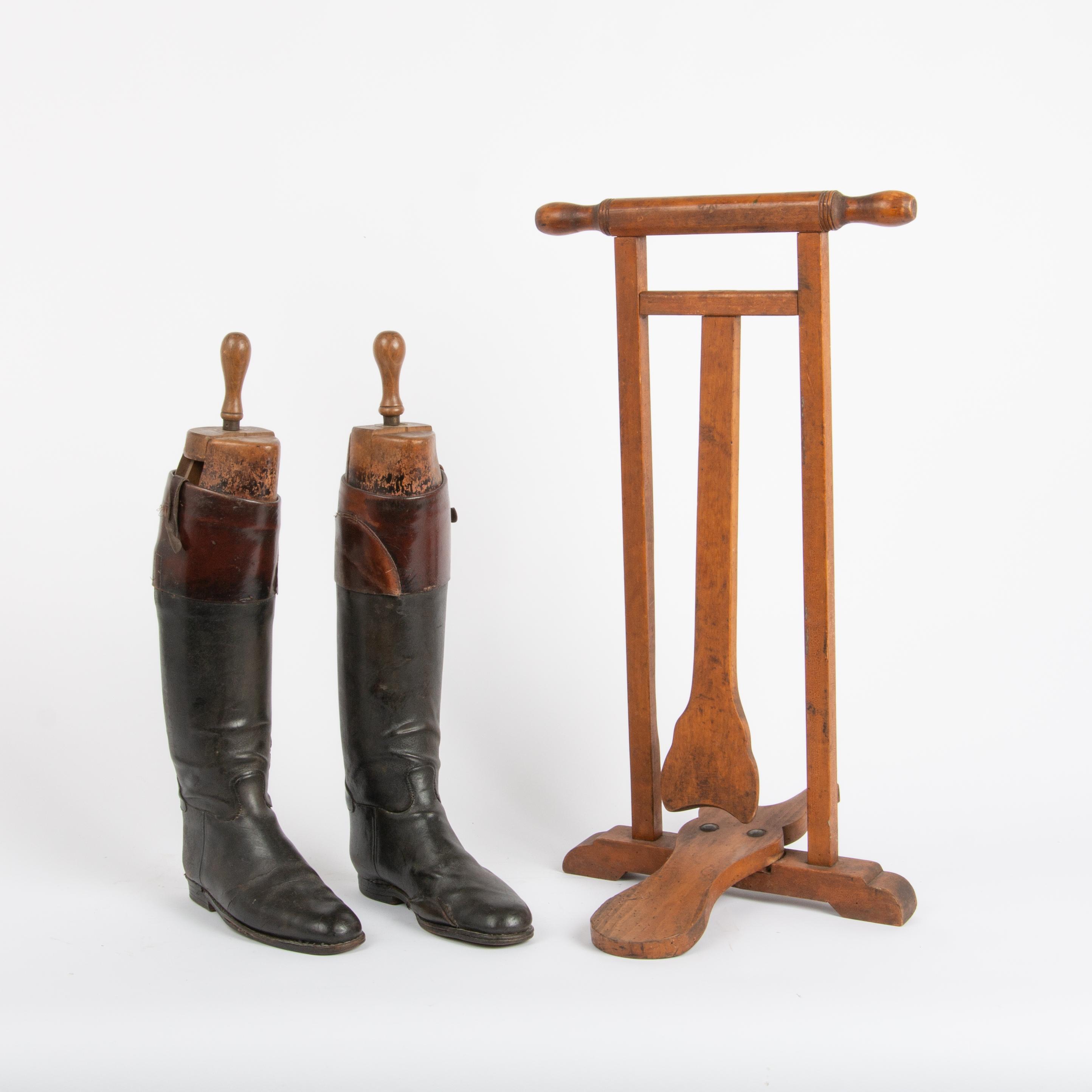 Appraisal: ANTIQUE MILITARY RIDING BOOTS AND CHERRY BOOT JACK A th